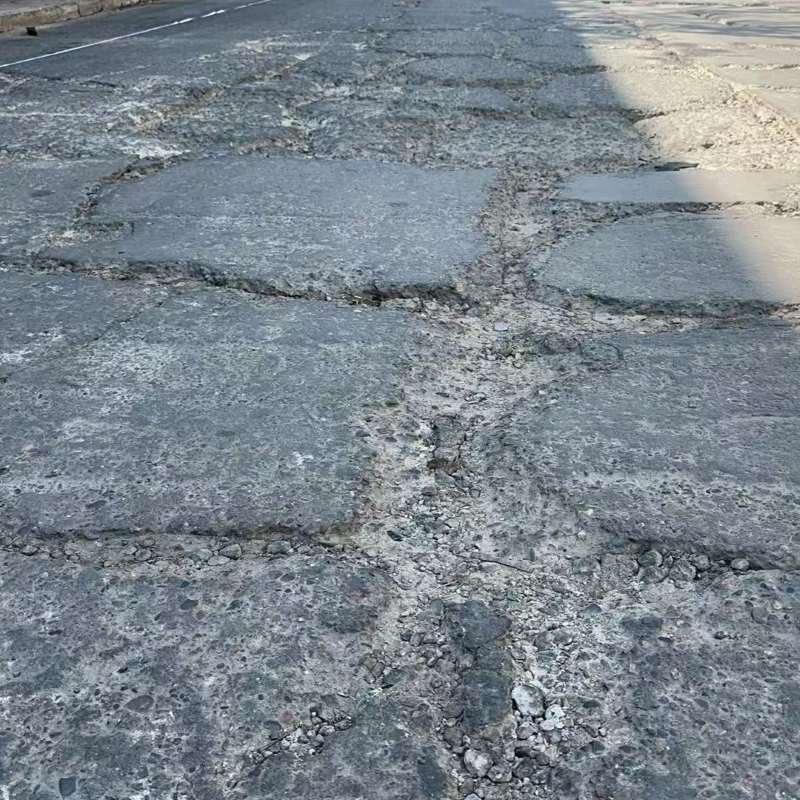 伊川路面起砂露石子修补料